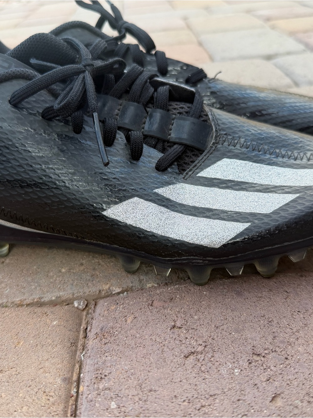 adidas Men's Black Soccer Cleats with Silver Stripes